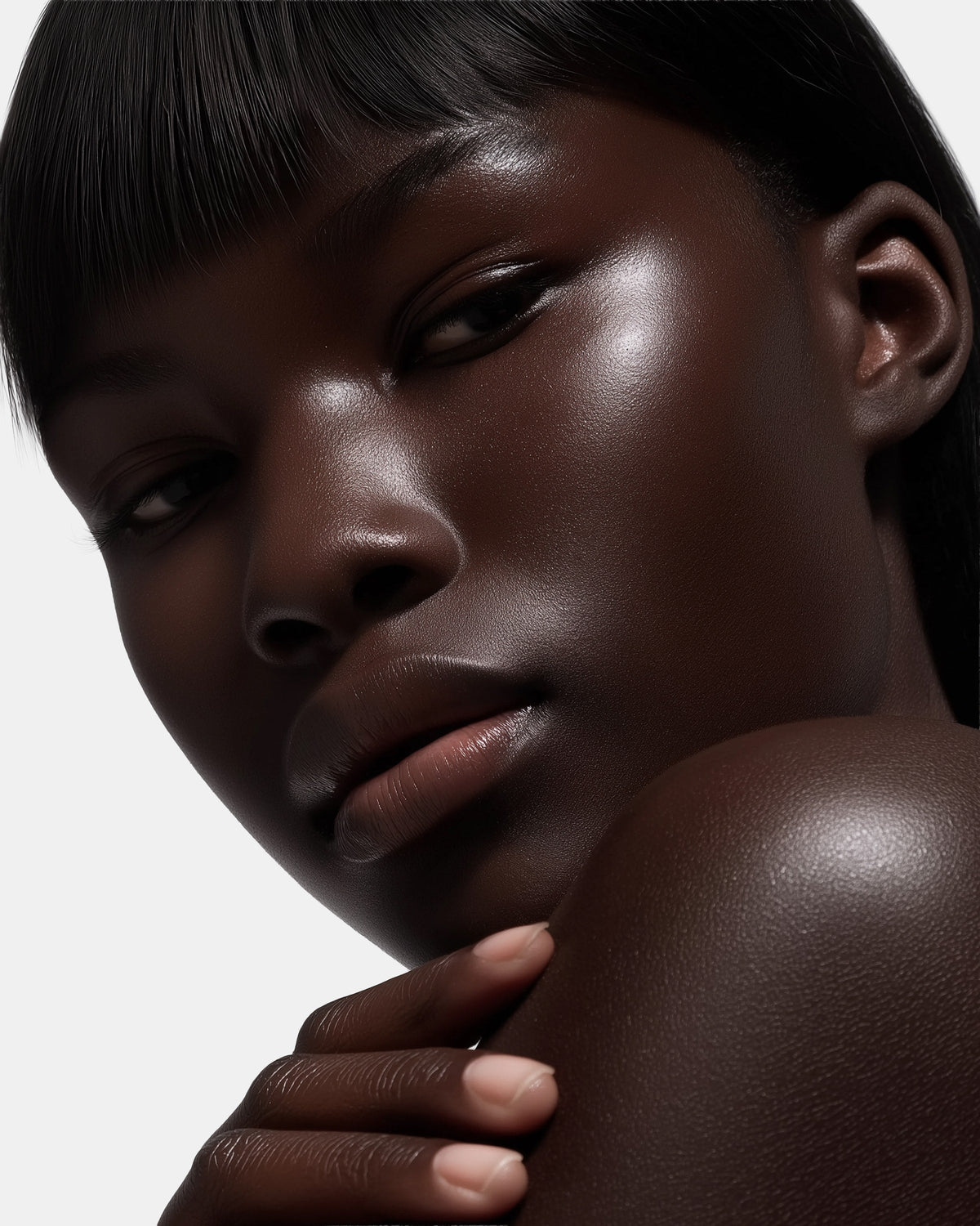 Person with glowing radiant skin in side profile
