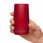 Hand holding red 10-ingredient body moisturizer container 