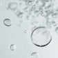 Clear bubbles on a light gray background