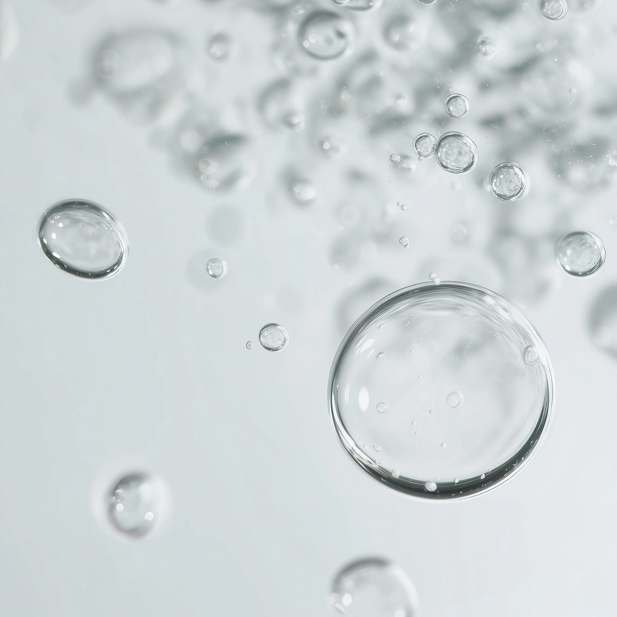 Clear bubbles on a light gray background