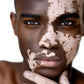 Close-up of a person with a sun-kissed face, highlighting skin texture.