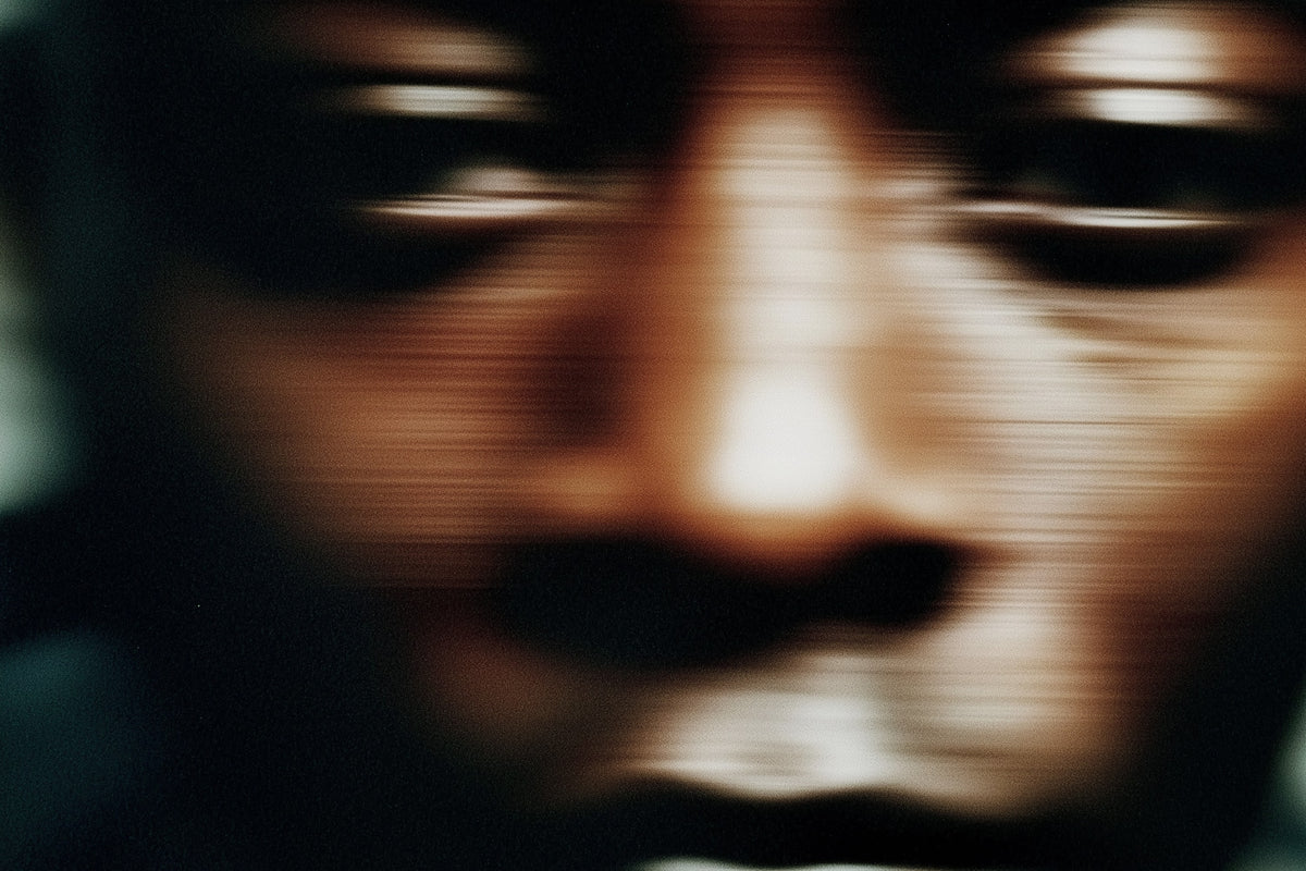 Blurred face with a dark background