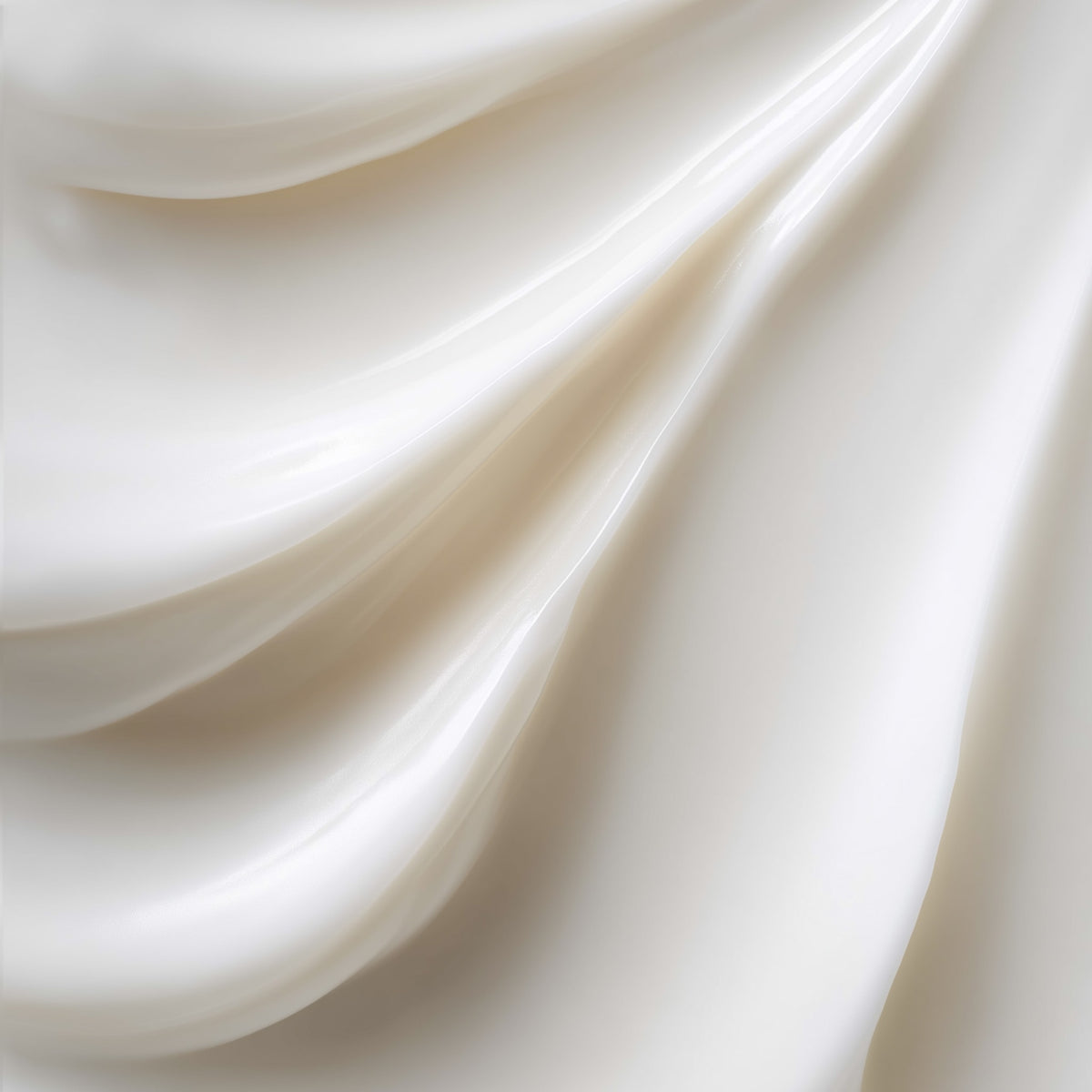 Close-up of smooth, white fabric with soft folds