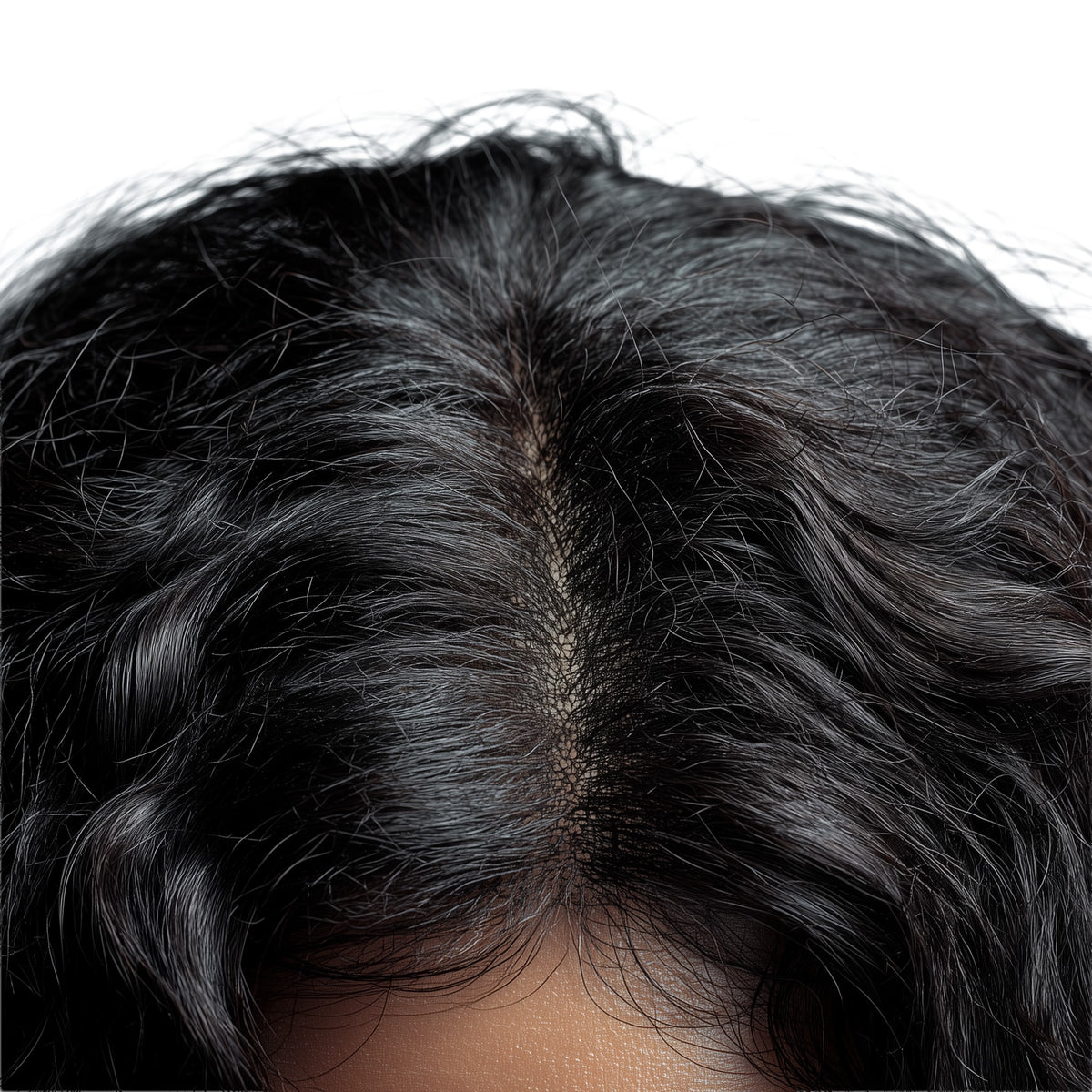 Close-up of a person's head with black hair on a white background