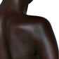 Close-up of a person's back with a white background