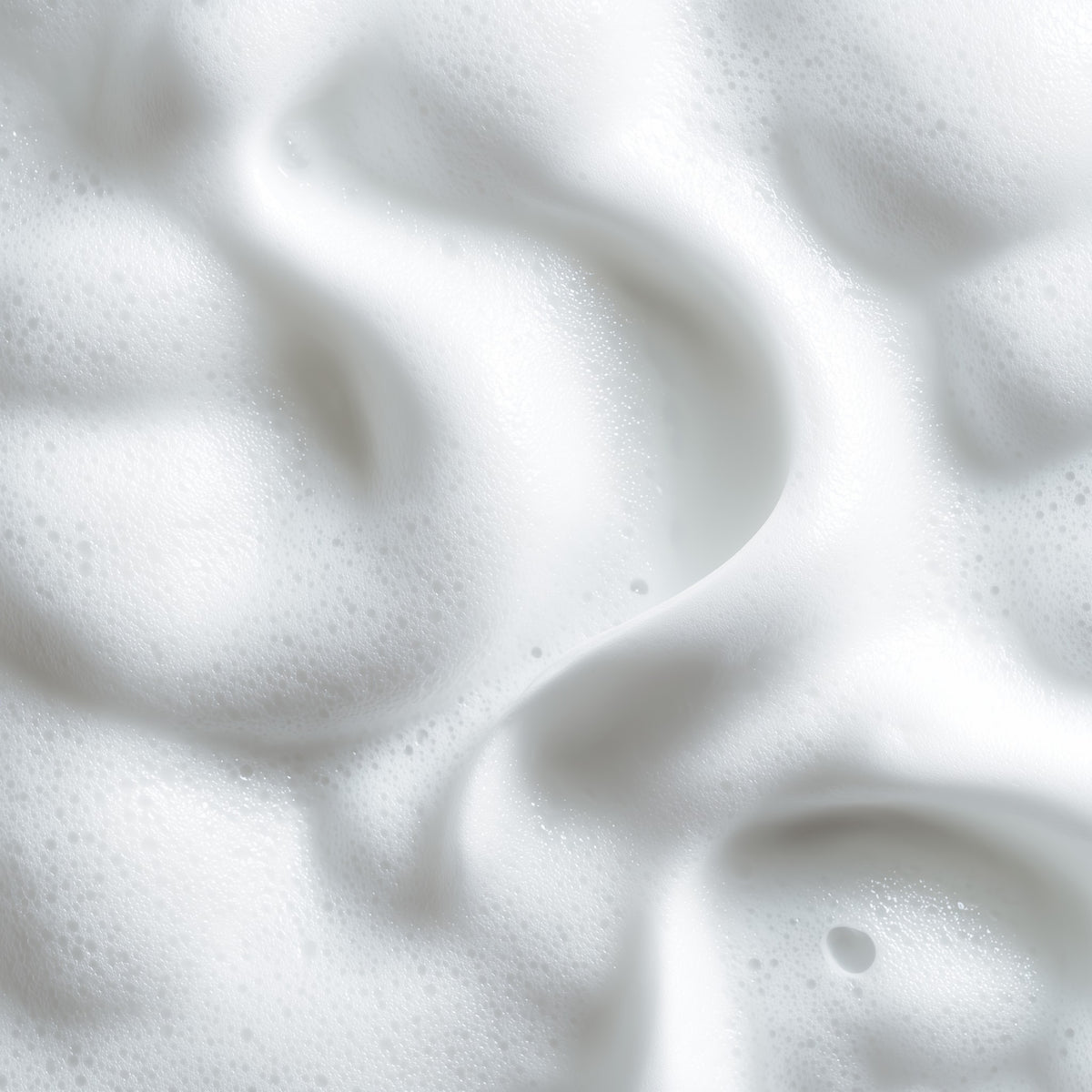 Close-up of white whipped cream with a soft focus