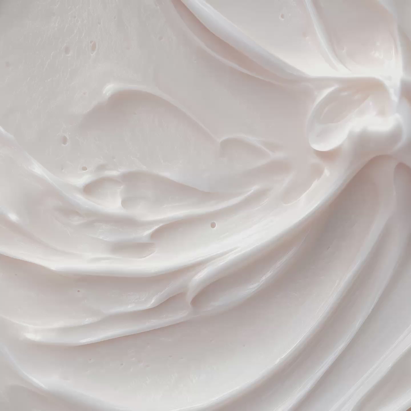 Soft white cream texture with swirled ridges