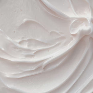 Soft white cream texture with swirled ridges