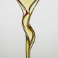 Swirling streams of golden and deep red oil in abstract composition