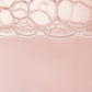 Close-up of a pink textured surface with a honeycomb pattern