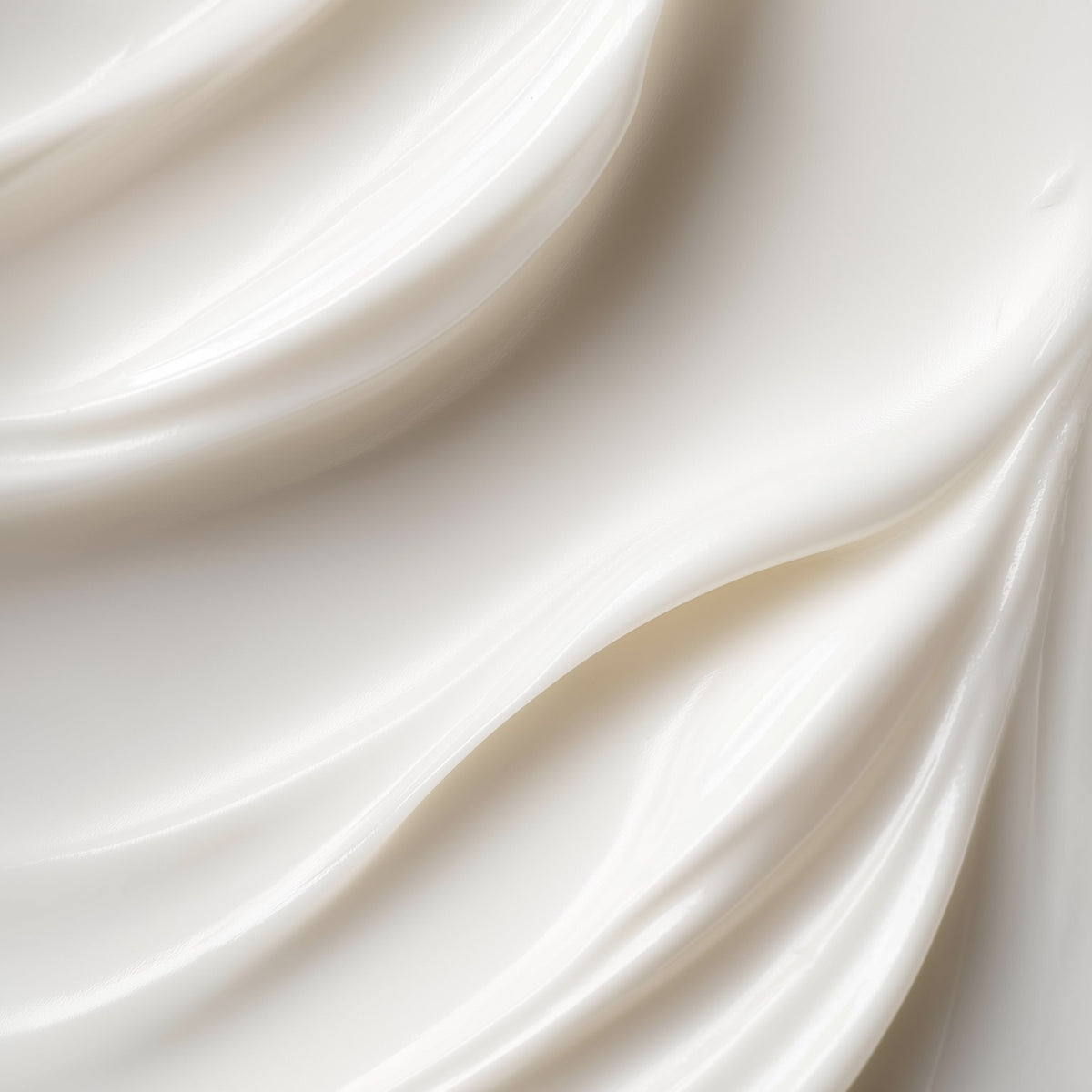 Close-up of white satin fabric with folds