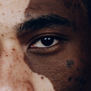 Close-up of a person's eye with a blurred background