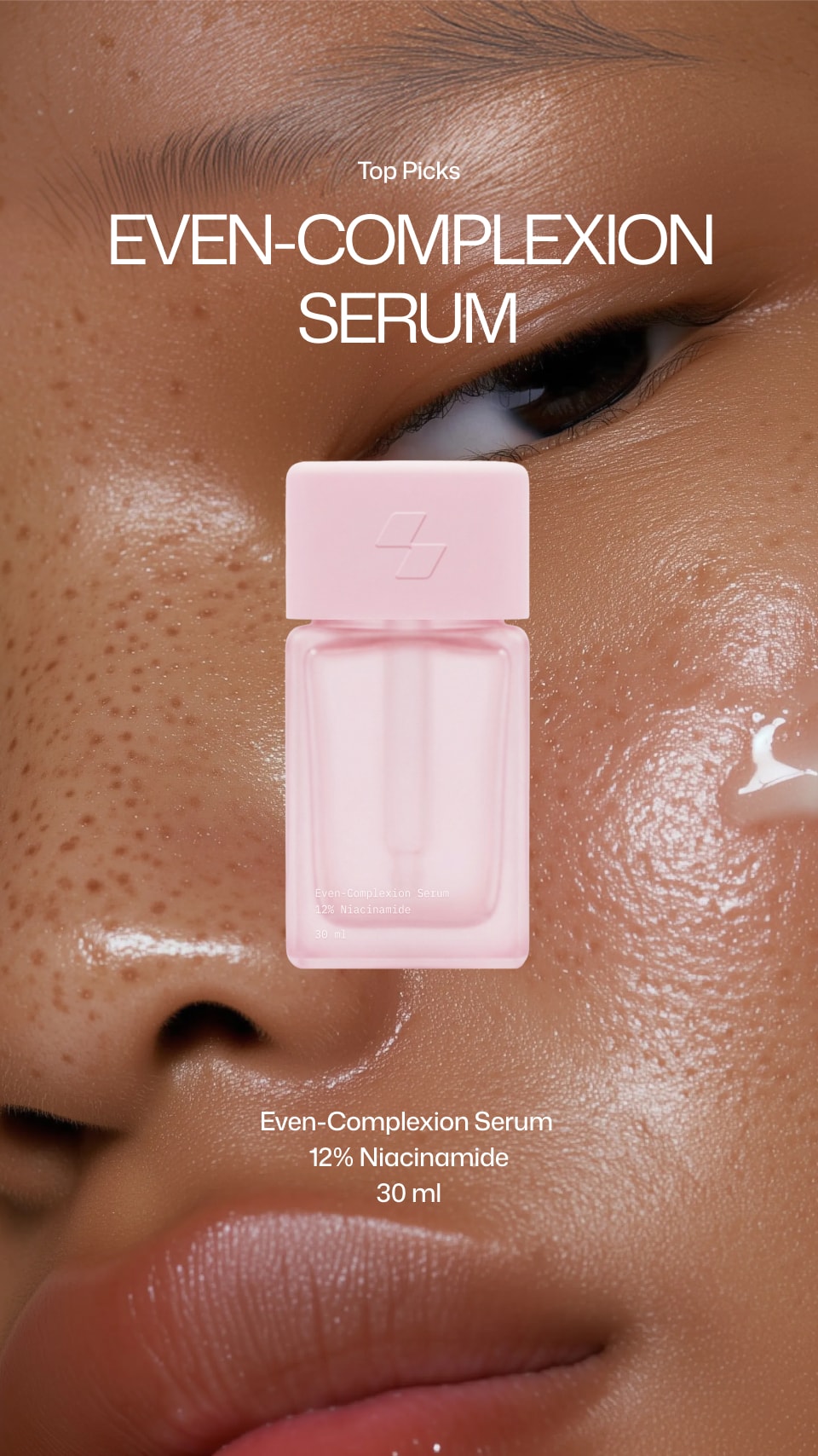Pink serum bottle with text 'Even-Complexion Serum' on a close-up of skin.