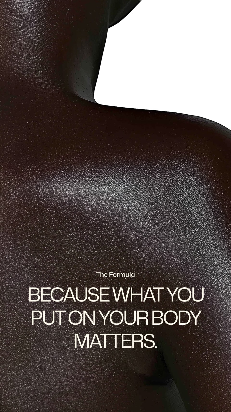Close-up of a person's shoulder with text 'The Formula BECAUSE WHAT YOU PUT ON YOUR BODY MATTERS.'