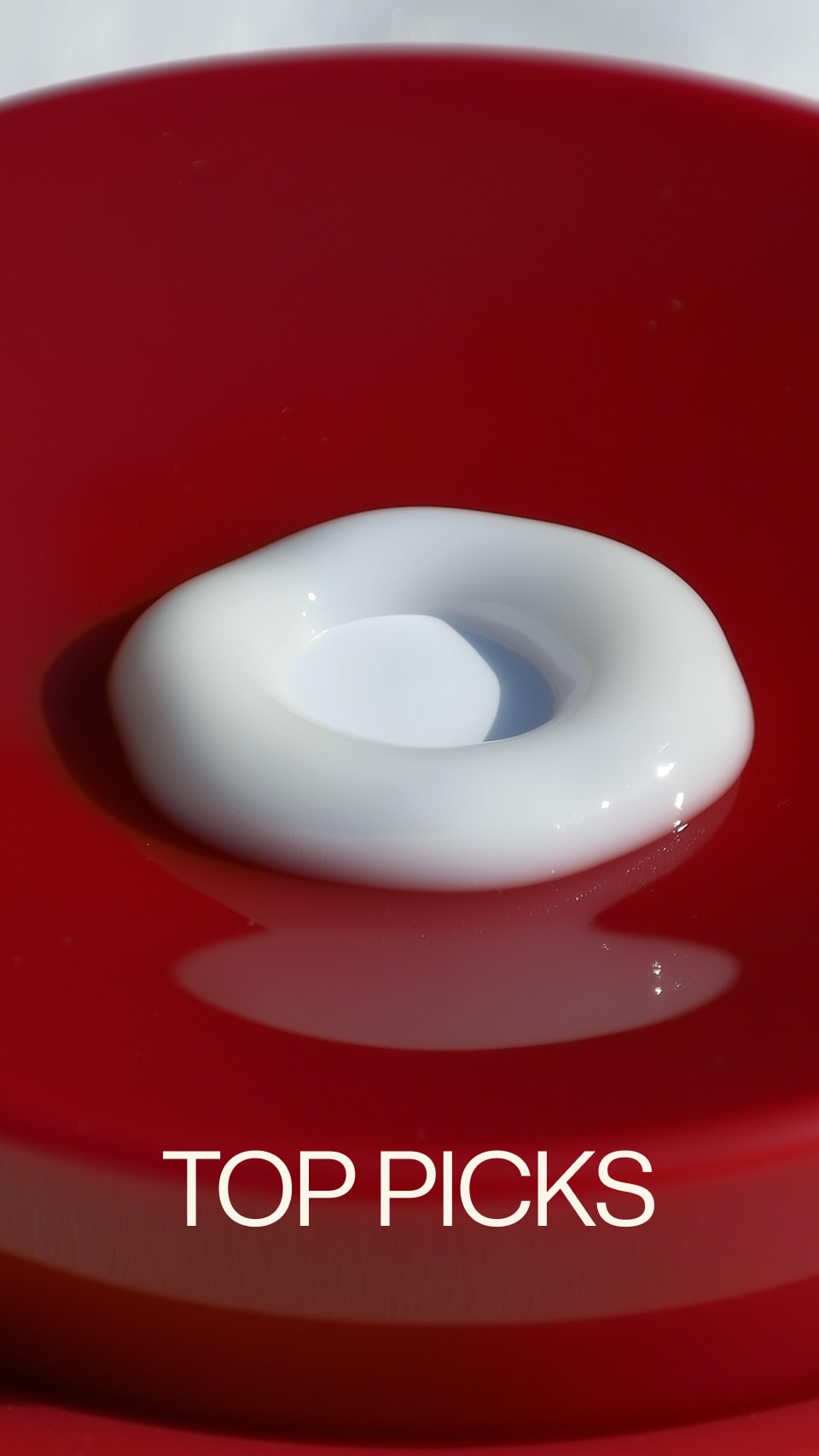 White donut-shaped object on a red background with 'TOP PICKS' text.